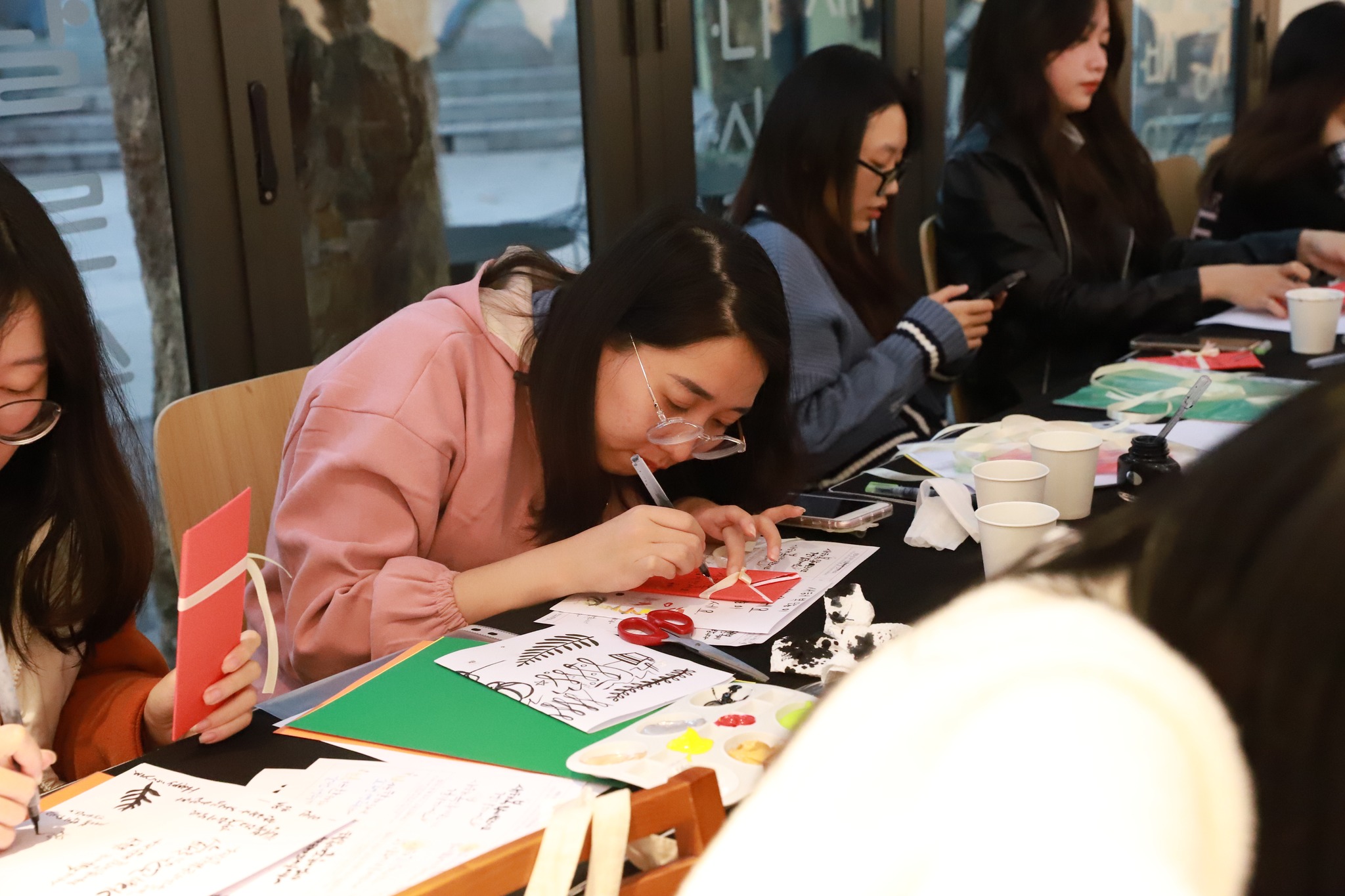 Clad in Hanbok (traditional clothing), reporters of the Corea Today pose for photos at the KCC in Rome, on Feb. 8, last year.   