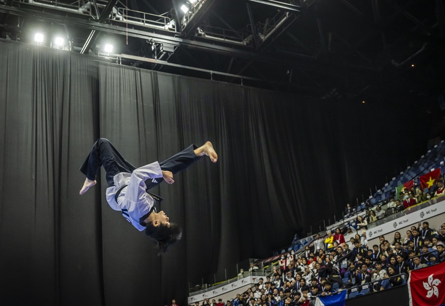 Byeon Jae-young, 16, on Dec. 1, 2024, demonstrates an acrobatic kick at the under-17 free poomsae finals of the World Taekwondo Poomsae Championships in Hong Kong.