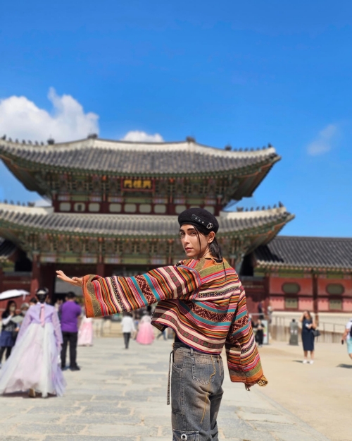 Q-pop creator and singer-songwriter Lenin Tamayo visited Korea in early October this year. He is shown posing for photos in front of Gyeongbokgung Palace in Seoul. (Tamayo's Instagram account) 